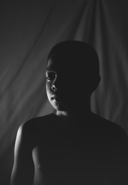 Black and White, Dark Photo of a Boy 