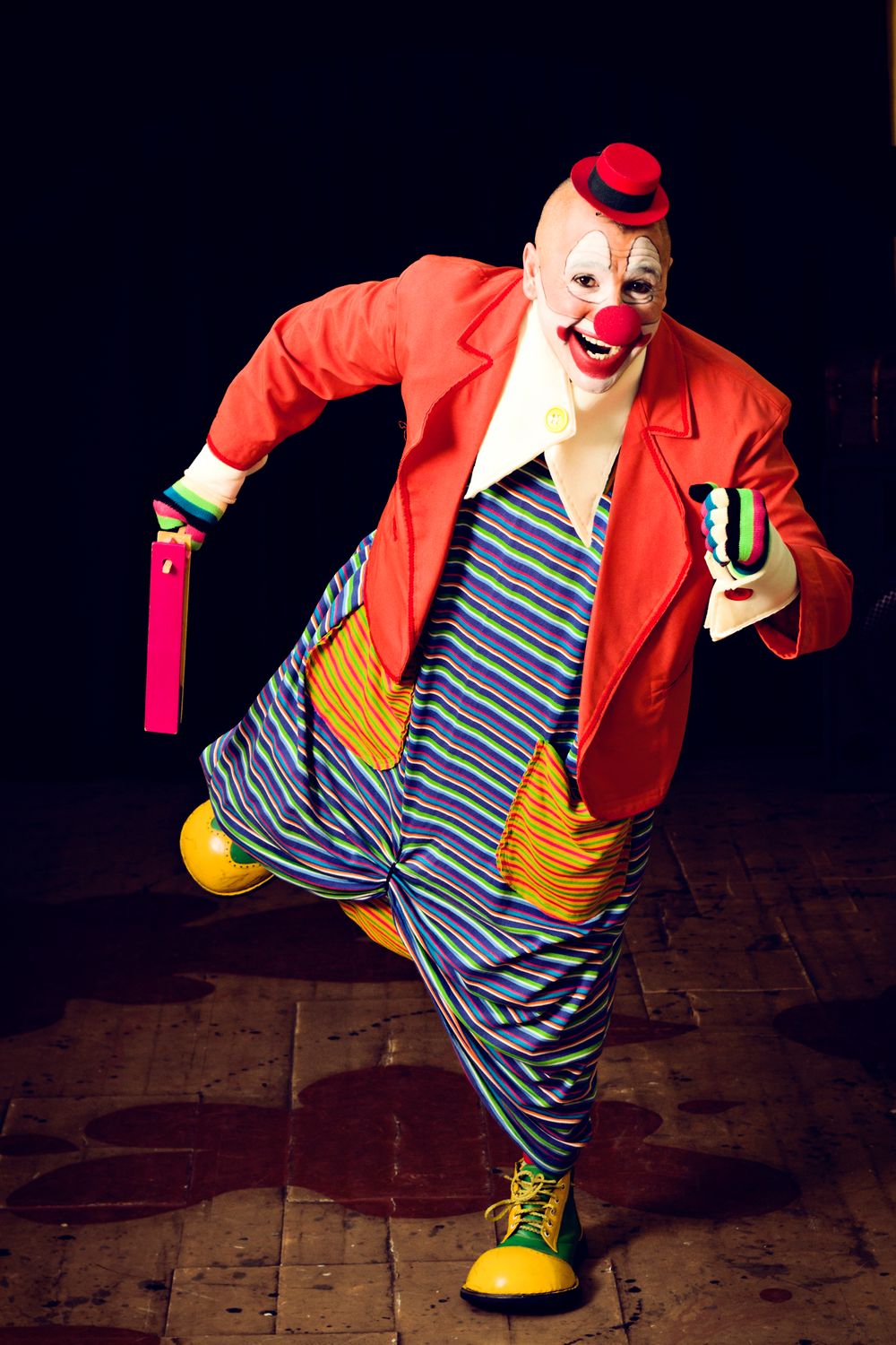 Clown Performing On Stage Free Stock Photo clown-performing-on-stage-free-stock-photo