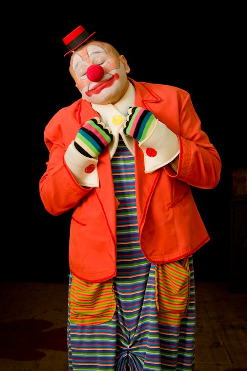 Funny Clown in Red Jacket