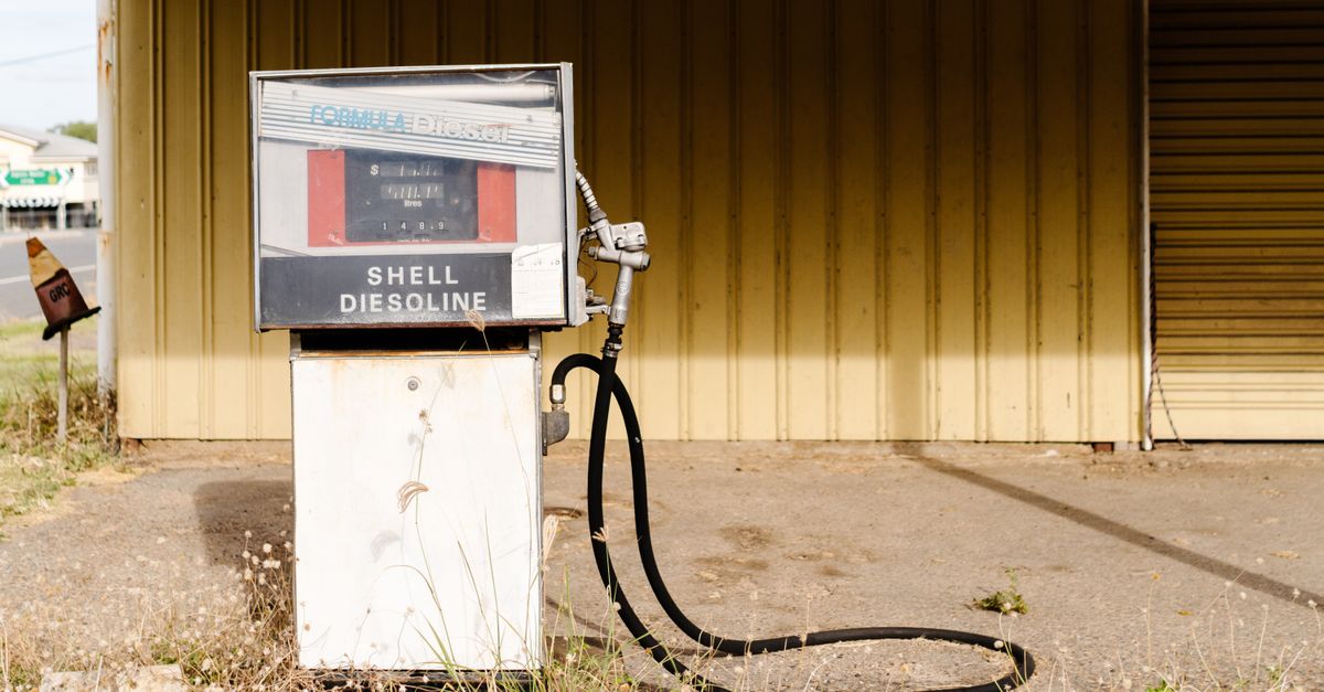 A fuel pump at a gas station, showing the energy prices behind Canada's 2026 inflation worry