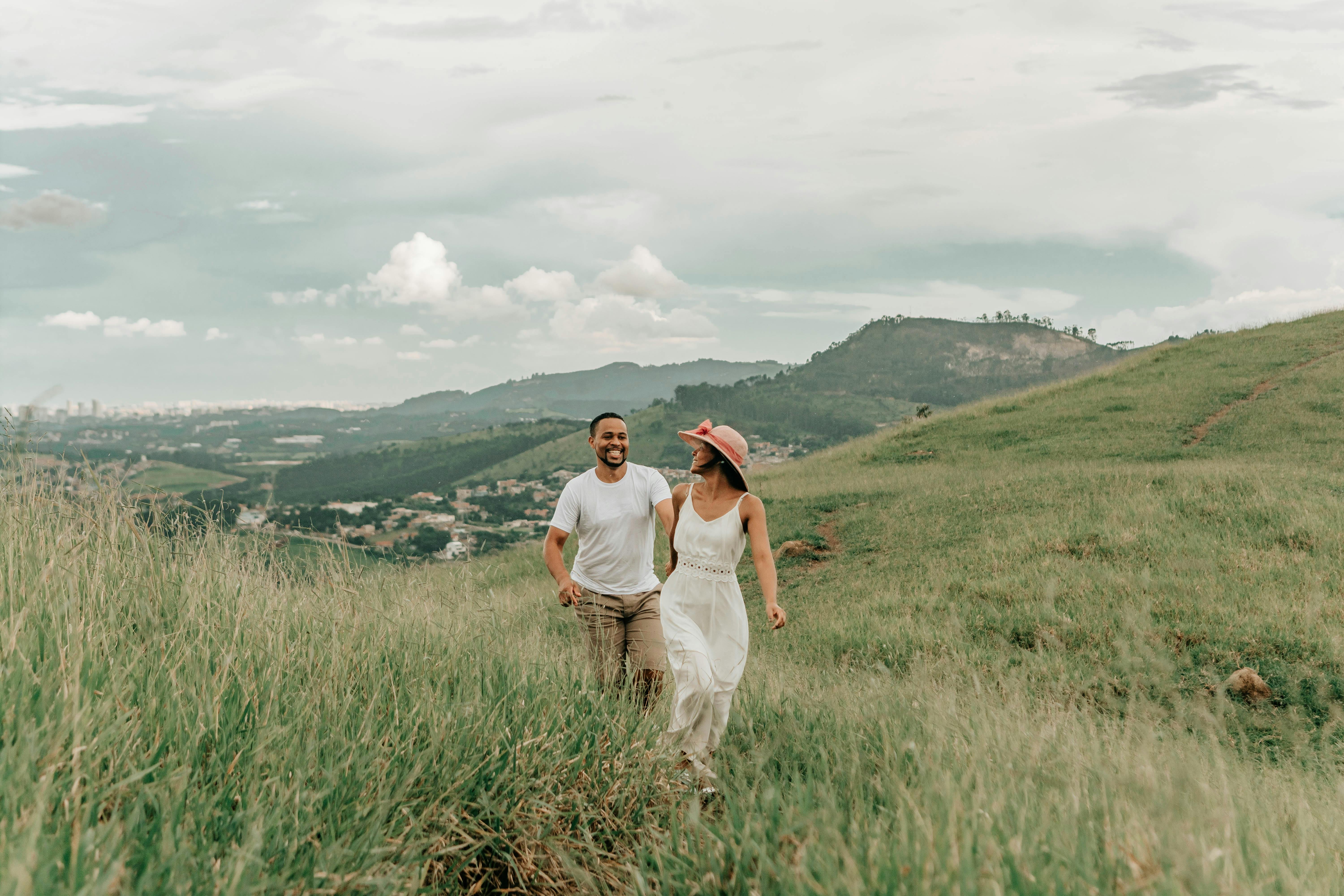 couple hiking outdoors together - Healthy relationship habits
