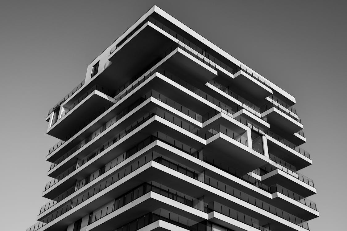 무료 콘크리트 건물의 회색조 사진 스톡 사진