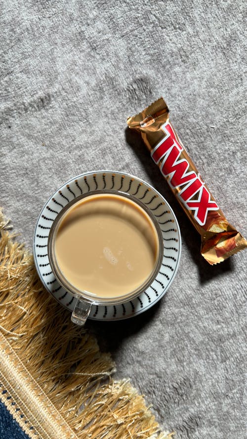 A Cup of Coffee and a Chocolate Bar 