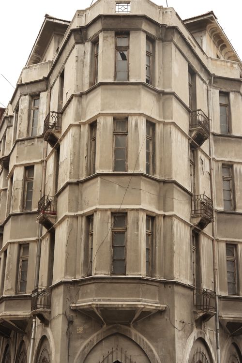 Free Aged facade of Erzurumlu Nafiz Bey Apartment, an iconic historical landmark in Turkey. Stock Photo