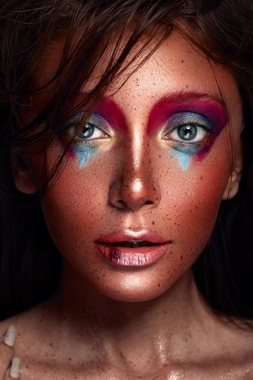 Beautiful Woman Wearing Colorful Makeup