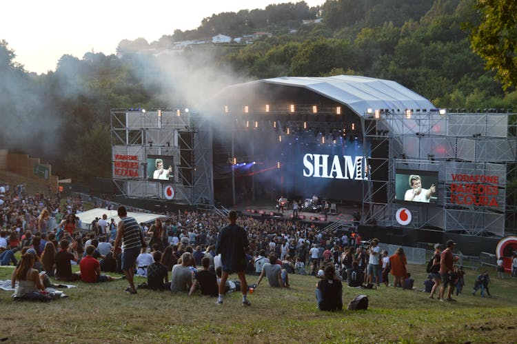 People Enjoying The Concert