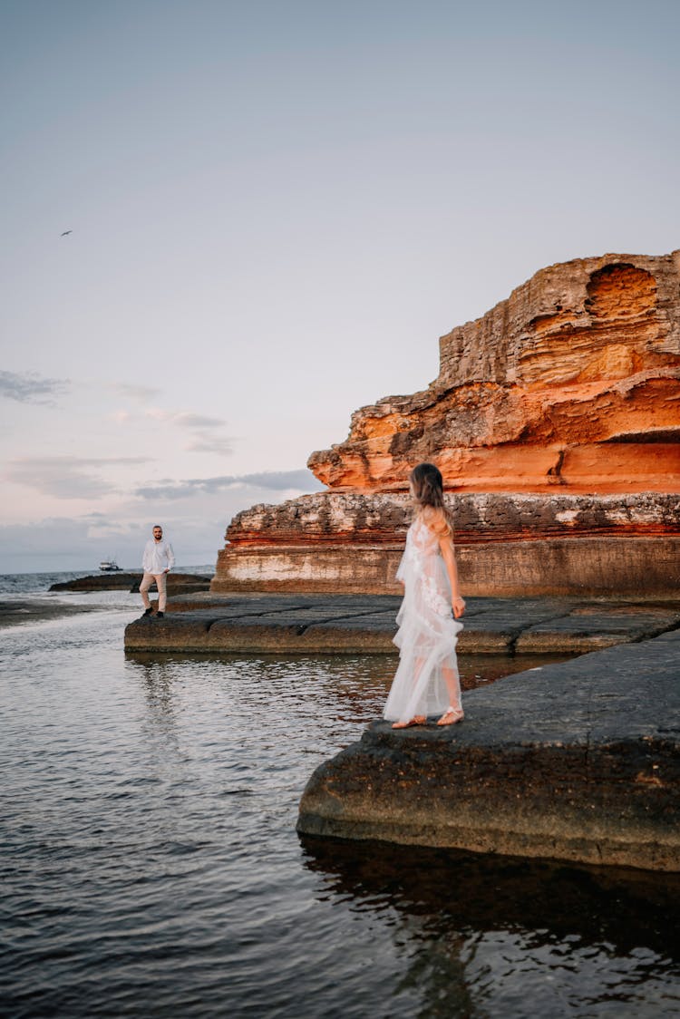 Man And Woman By Sea