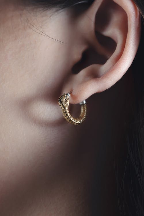 A Golden Earring in an Ear