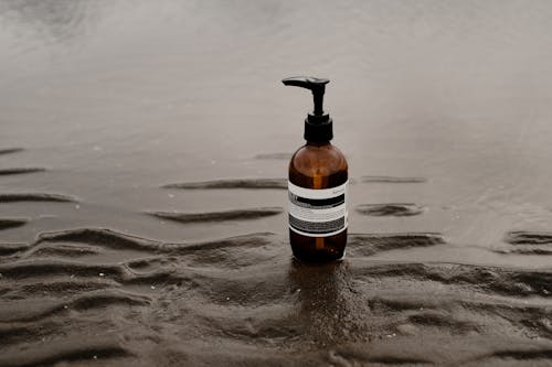 A Bottle of Cosmetics on Water