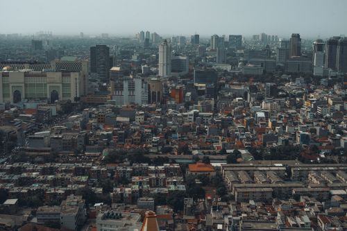 Free Aerial view of Jakarta's skyline, showcasing urban density and skyscrapers. Stock Photo