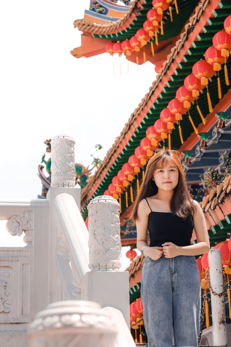 Woman Standing Near Temple