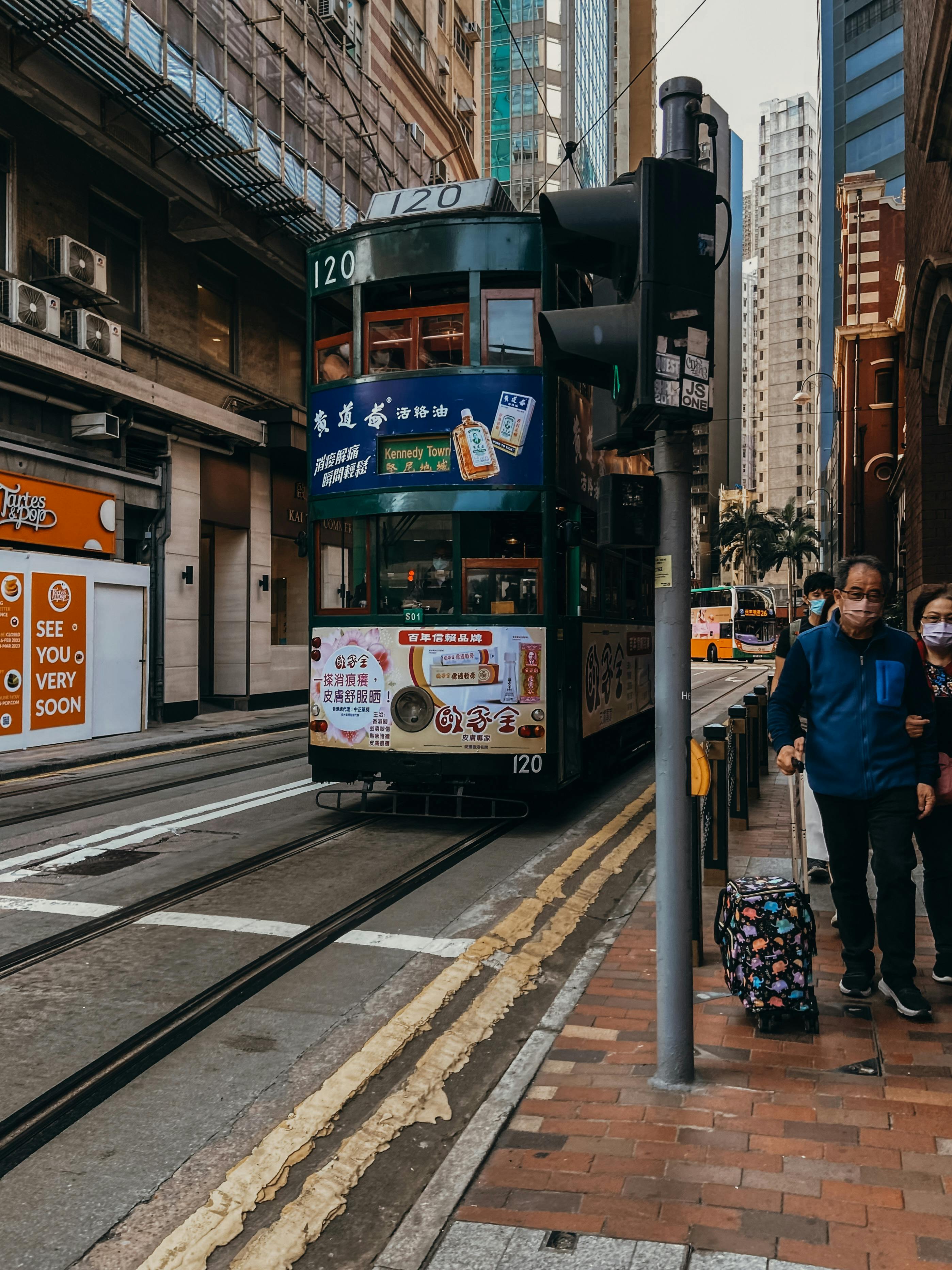Cable Car Waiting in Front of a Stoplight · Free Stock Photo