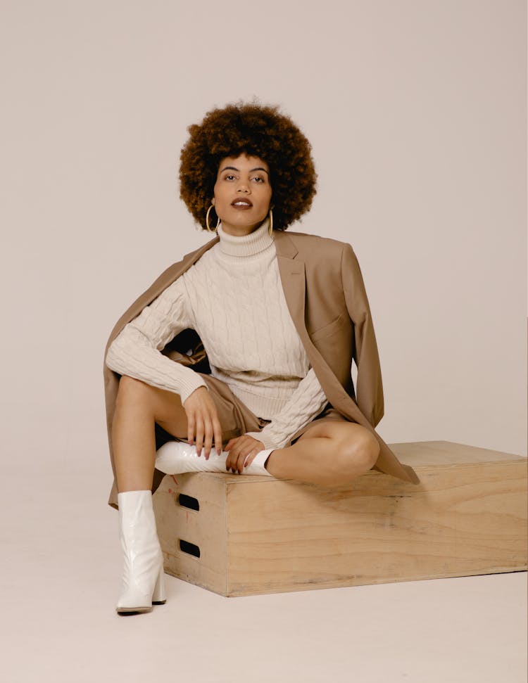 Model In A Fashionable Beige Outfit Posing In Studio 