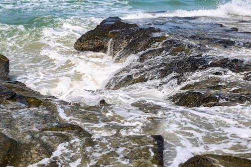 Waves Splashing on Rocks in Ocean