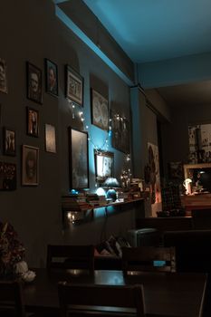 A cozy café interior in Sakarya with art and soft lighting creating a warm ambiance.