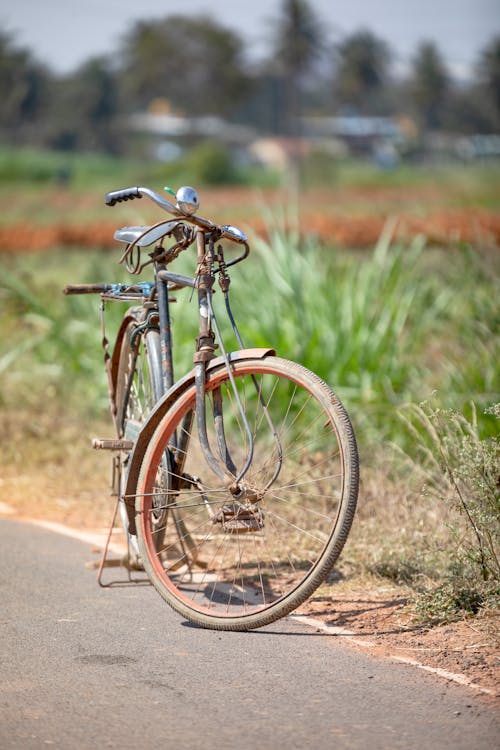 Foto profissional grátis de área, bicicleta, estrada