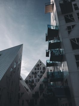 Low angle view of modern residential buildings with unique design in Aarhus, Denmark