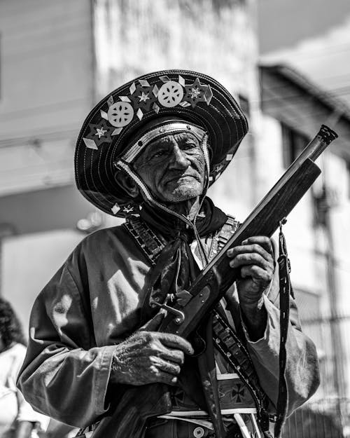 Performer in Costume Holding a Gun