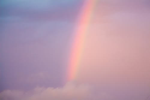 Rainbow and Clouds on Sky