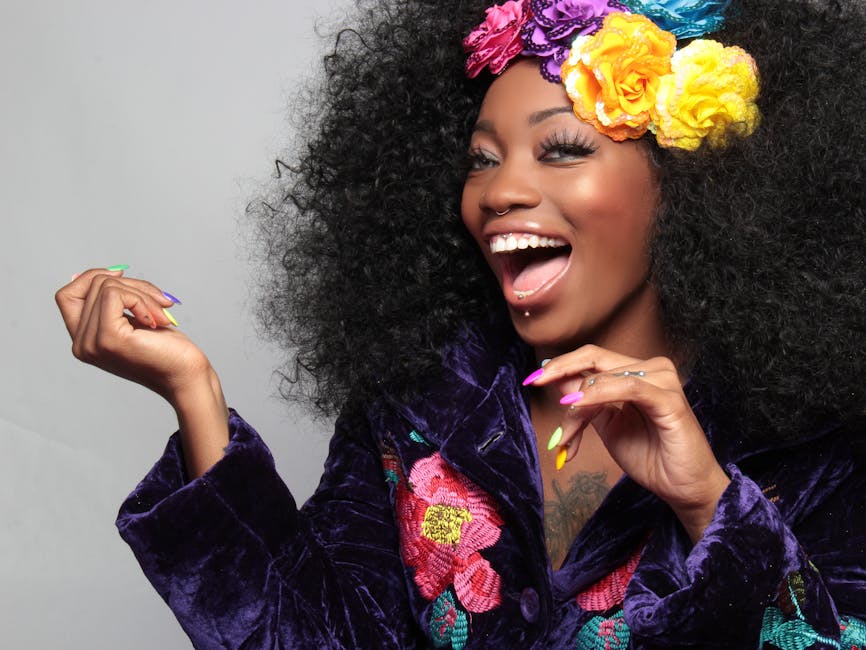 Woman Wearing Yellow Purple and Blue Flower Hair Clipper