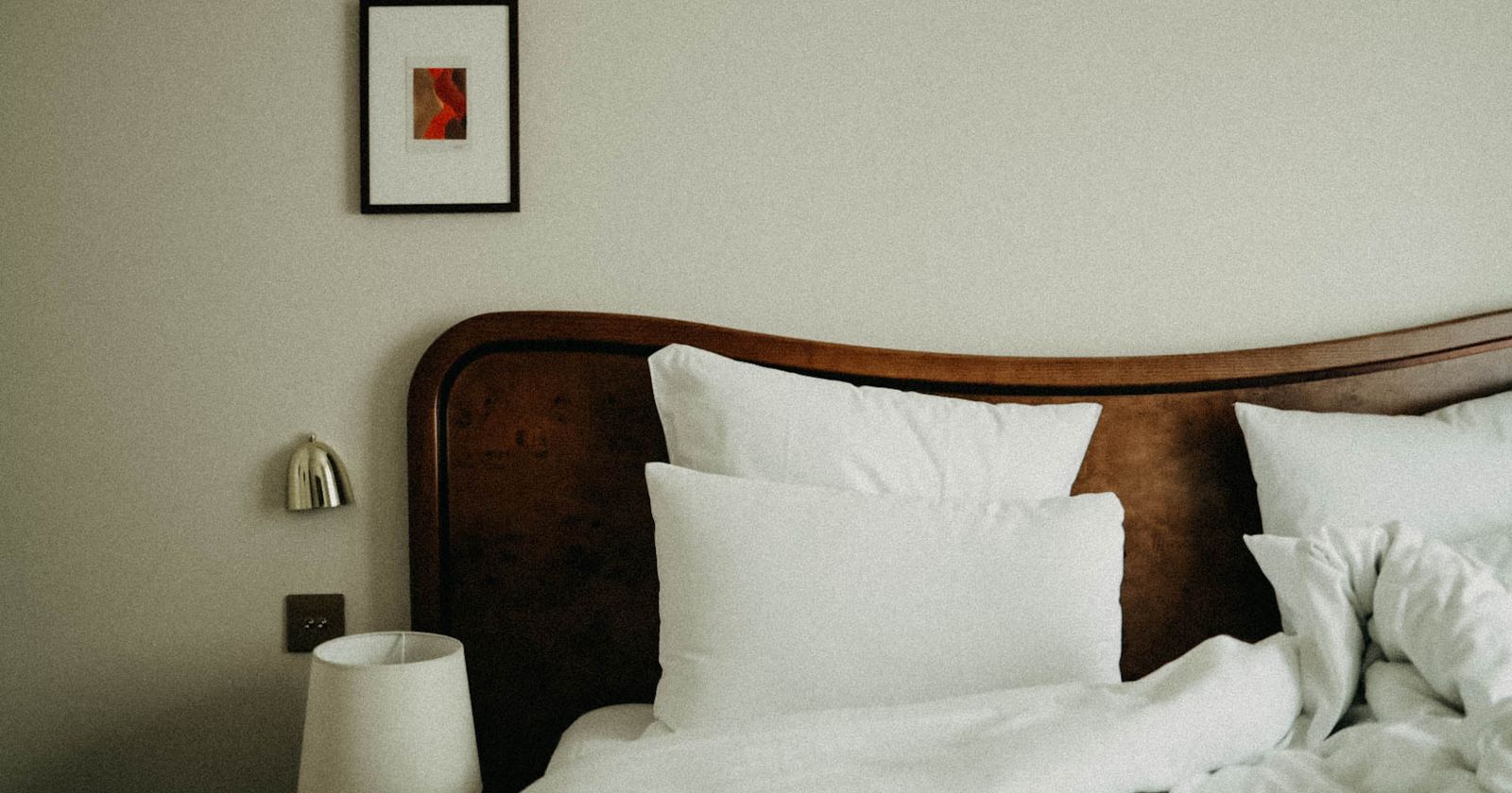 Comfortable hotel room with a made bed and natural light