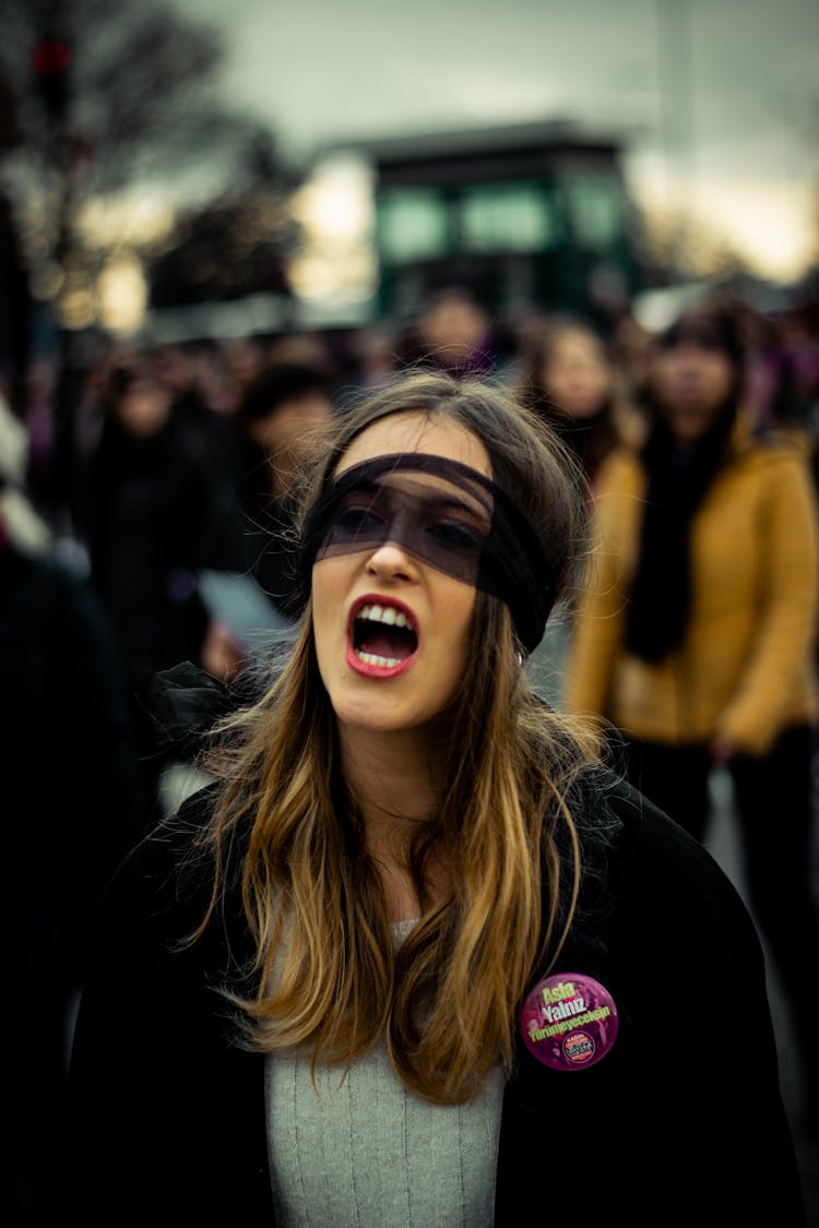 Woman With Transparent Blindfold Screaming On Street