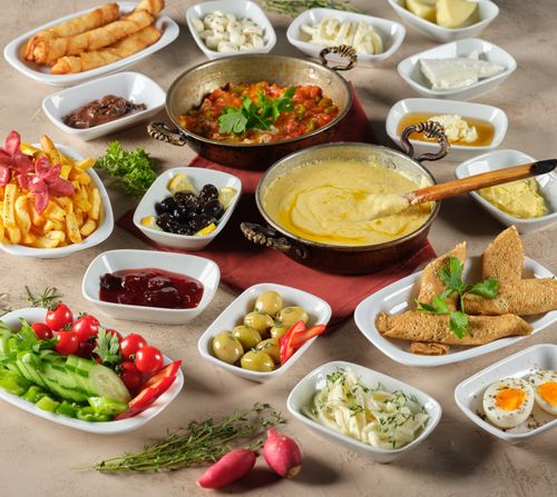 Free A vibrant assortment of Mediterranean dishes including hummus, olives, salad, and more, captured from above. Stock Photo