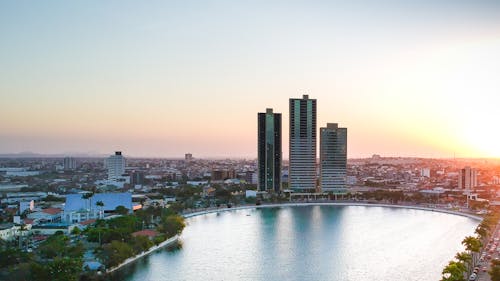 City Buildings Beside Lake