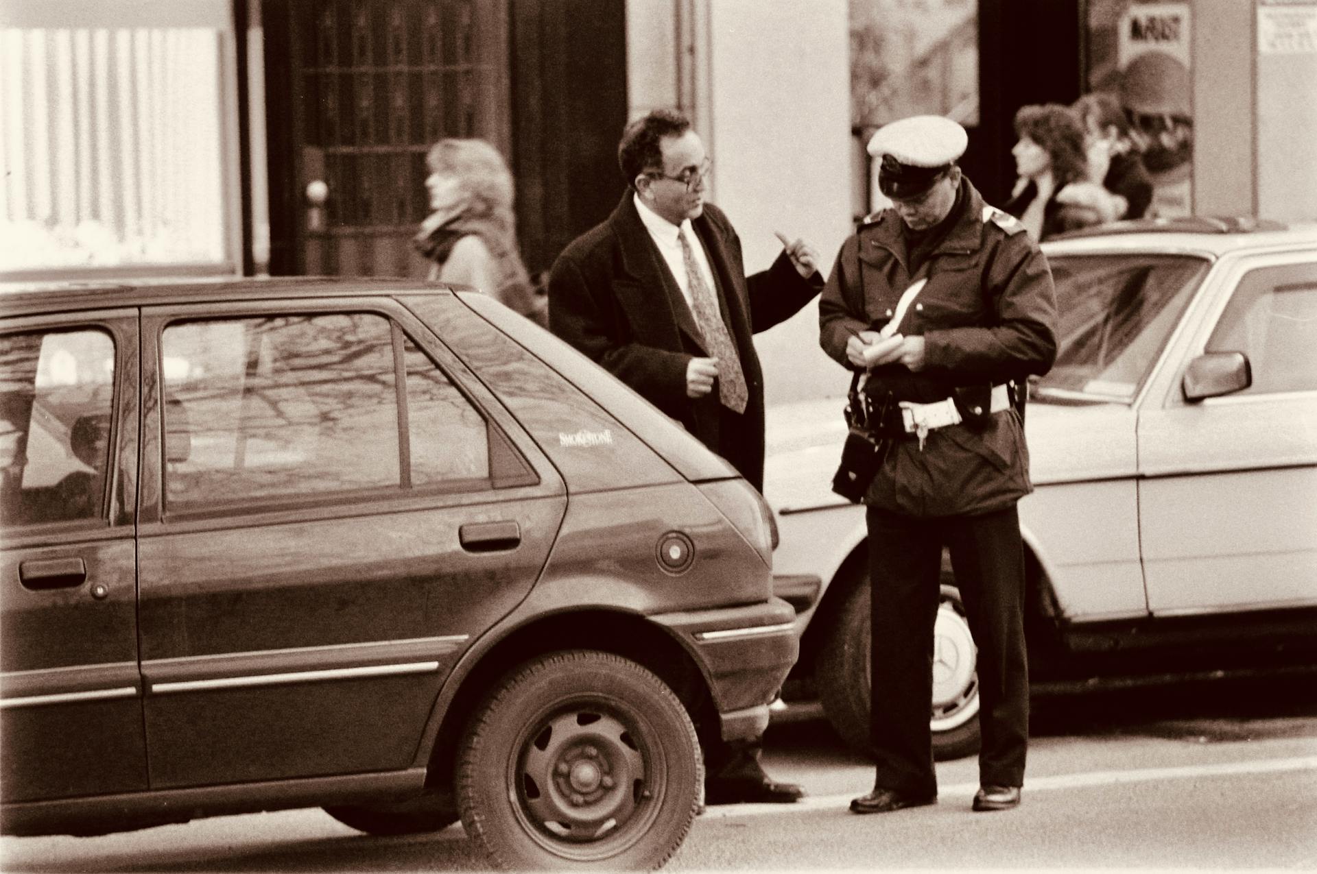 Police Officer Writing a Parking Ticket