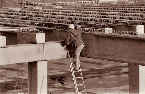 Construction Worker Cllimbing Ladder