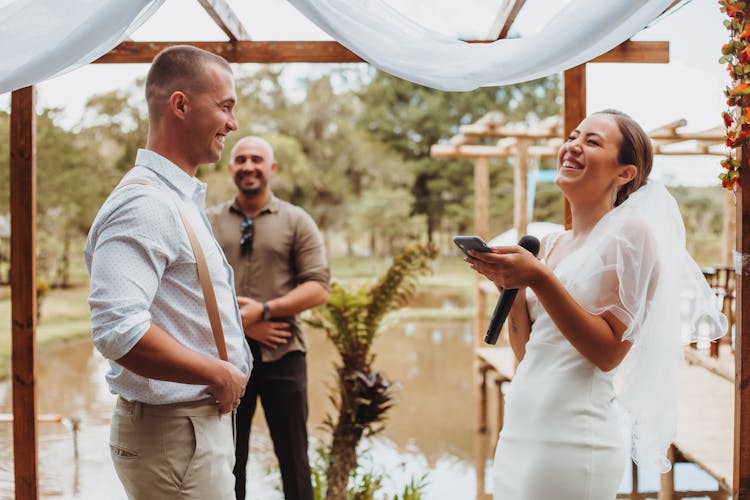 Smiling Newlyweds On Wedding Ceremony