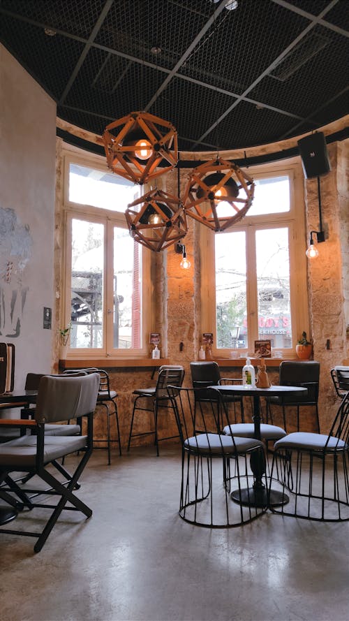 Round Cafe Interior with Wooden Lamps