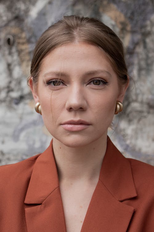 Brunette Young Woman with Earrings