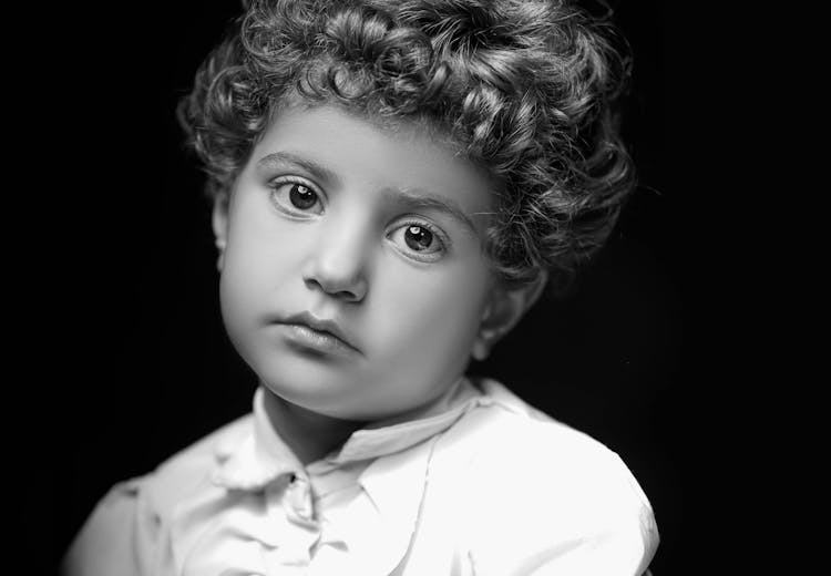 Portrait Of Child With Curly Hair