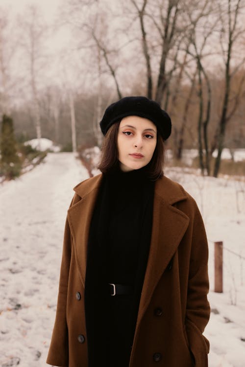 Woman in Hat and Coat in Winter