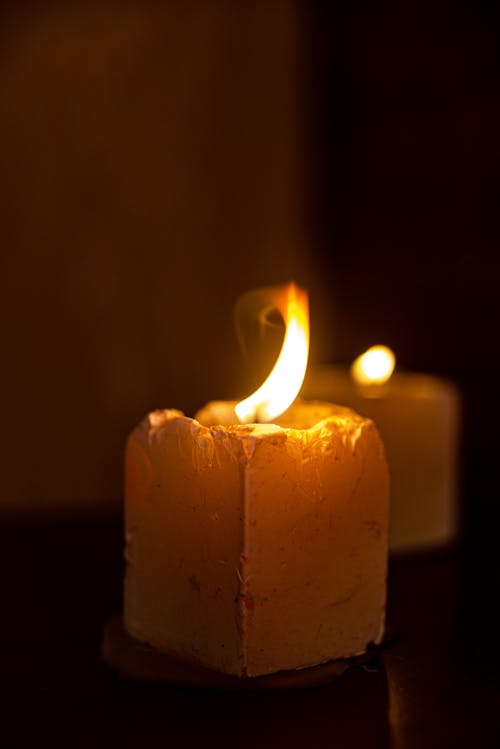 Close up of Burning Wax Candles