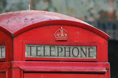 Close-up of a Traditional Red Telephone Booth