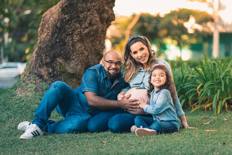 Pregnant Woman With Happy Family