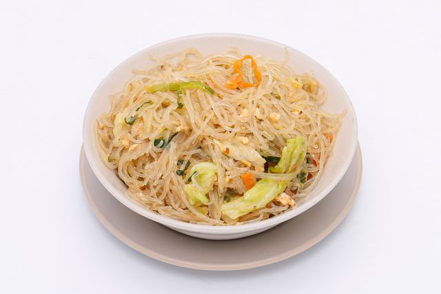 A mouthwatering dish of stir-fried vermicelli noodles with vegetables and egg.