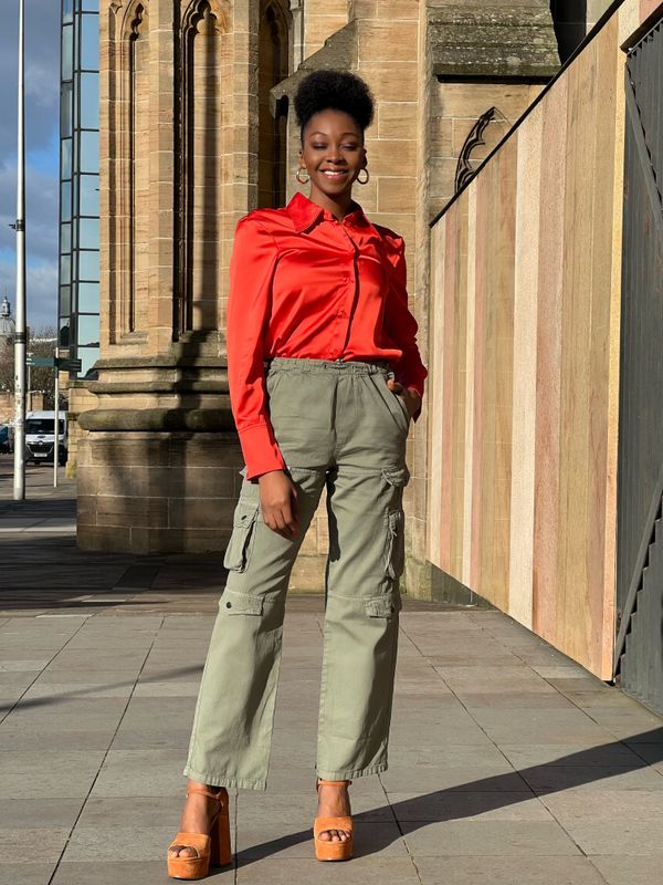 Woman in cargo pants travel outfit