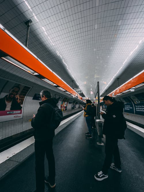 Passenger Standing at Subway Platform