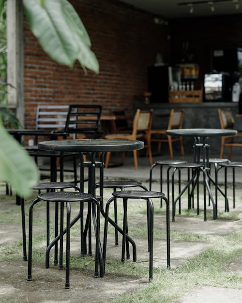 Bar Stools and Tables in Patio of Restaurant