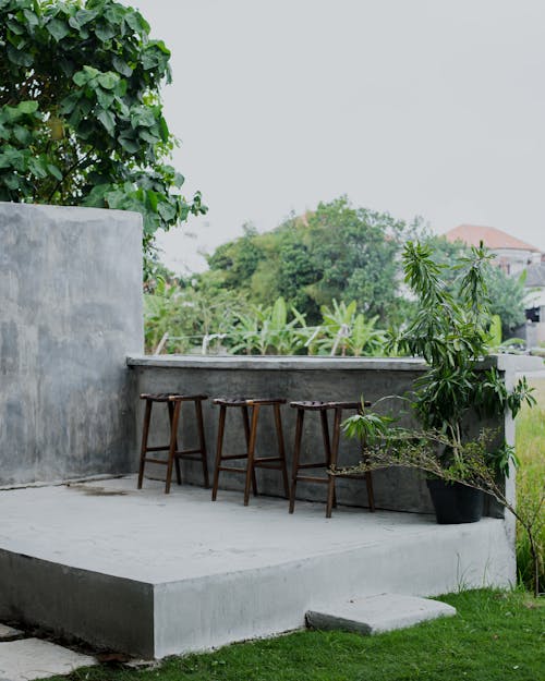 High Stools on a Concrete Patio 