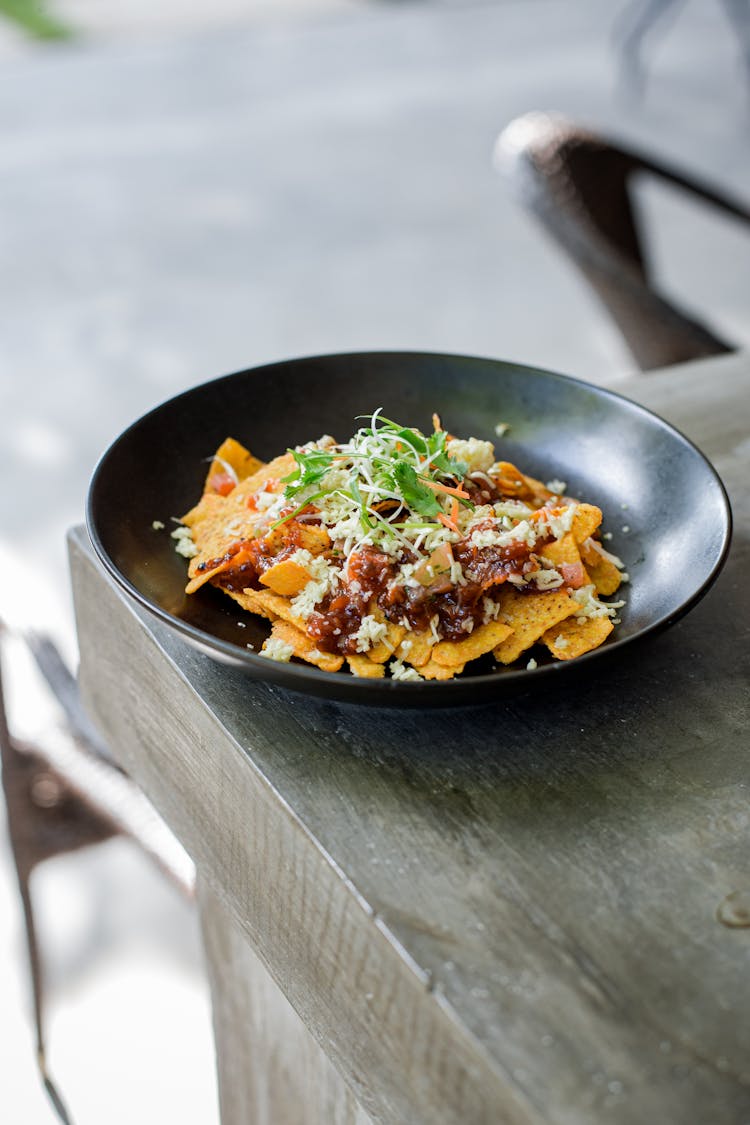 Nachos With Topping On A Plate 