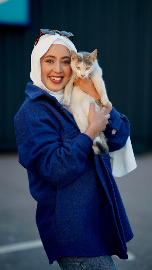 Smiling Woman with Cat