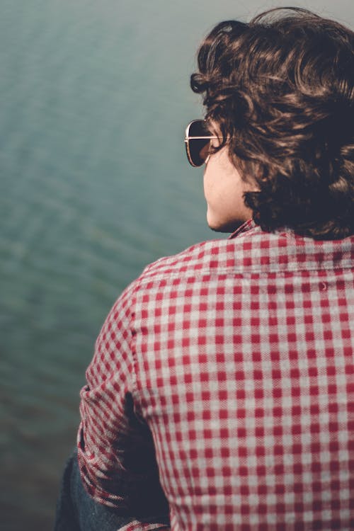 Man Wearing Red and White Flannel Shirt