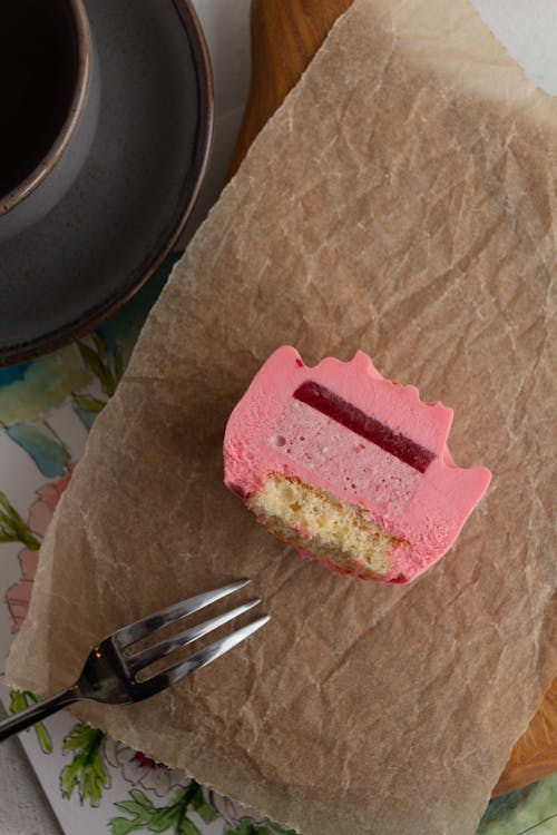 Pink Cake Lying on a Piece of Paper