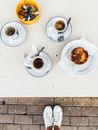 Aerial Photography of Four White Ceramic Cups