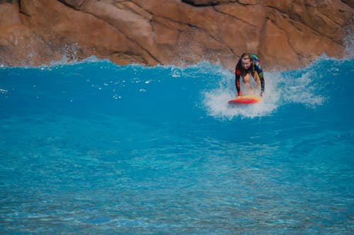 Young Woman Surfing 