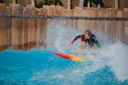 Young Woman Surfing 